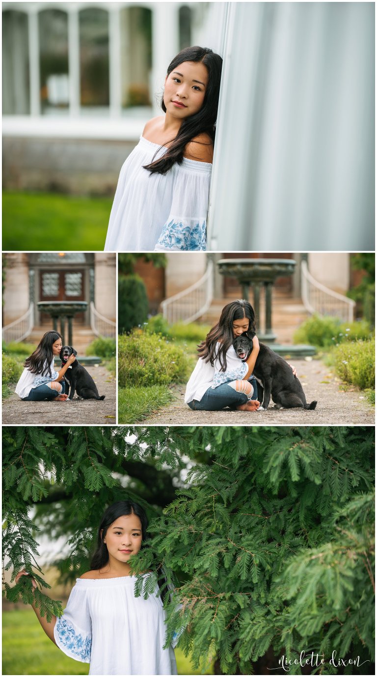 High school senior woman poses with her dog at Phipps Conservatory near Pittsburgh