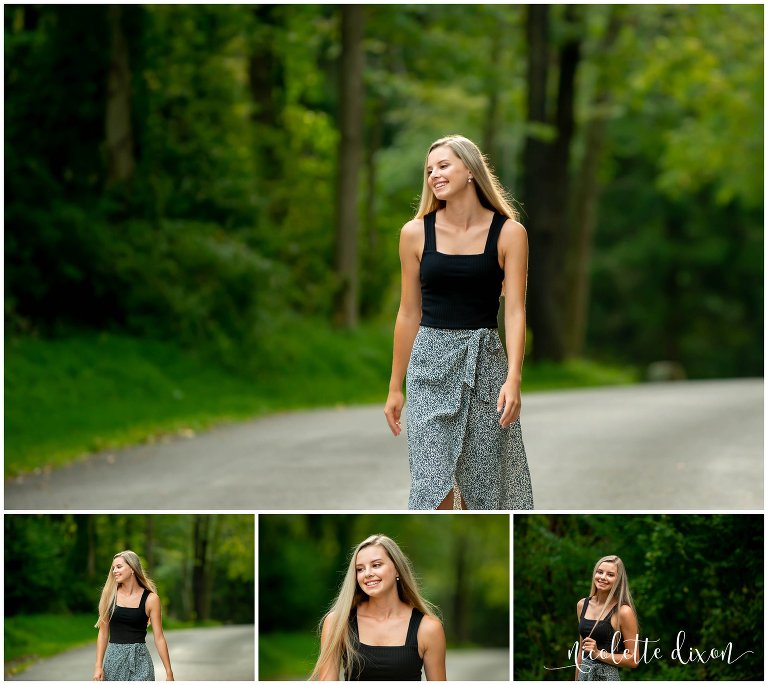 High school senior girl walks along road in Sewickley Heghts Borough Park near Pittsburgh