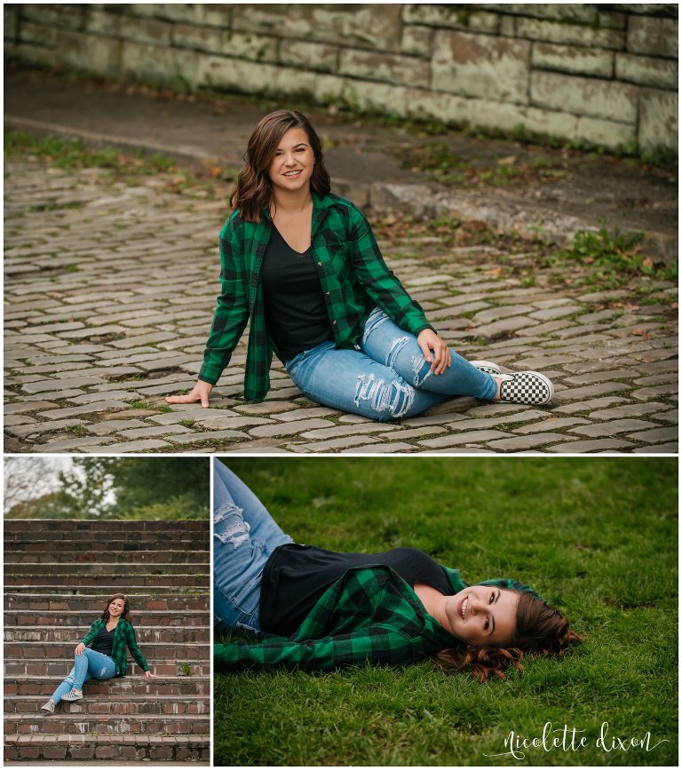 High school senior girl sits on steps and cobblestone in Mellon Park near Pittsburgh